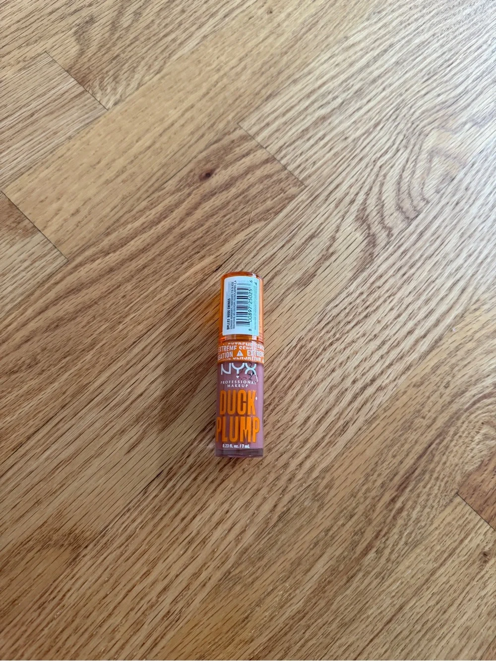 NYX duck plump nude swings lipgloss